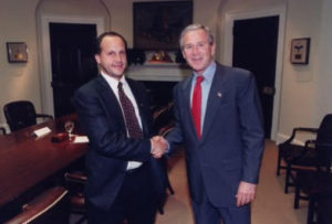 Nationwide Finance President Ed Kostenski with US President George W. Bush.